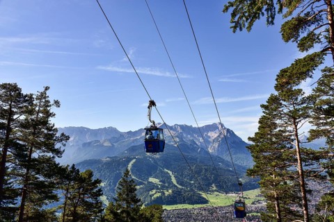 View from Wank (1780 m) of Garmisch-Partenkirchen and the massif of Zugspitze (2962 m), Bavaria,
