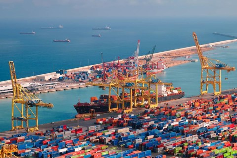 BARCELONA, SPAIN, APRIL 17, 2019: View of cargo ship unloading in Barcelona port terminal with