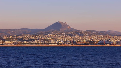 Coastline, mountain, sea, view from sea, blue cloudless sky, Heraklion, capital, island of Crete,