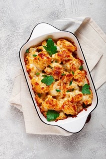 Baked cauliflower, in cream sauce, with cheese and spices, homemade, no people