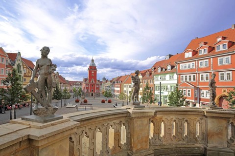 Three sculptures Prudentia, Caritas and Fortitudo by Bernd Göbel 2021 on balustrade with blurred
