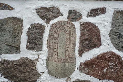 Rune stone embedded in a wall in Glemmingebro, Ystad Municipality, Skåne County, Sweden,