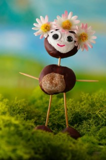 Chestnut figure with blossom headdress in the studio, North Rhine-Westphalia, Germany, Europe