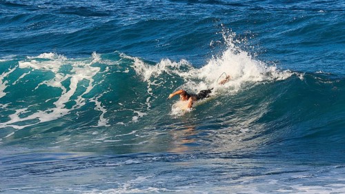 Surfer riding a big wave in the blue sea, wave surfer, surfer, surf, waves, west coast, Arkasa,