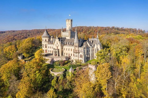Drone shot of Castle Marienburg south from Hannover, on Mt Marienberg above river Leine, autumnal