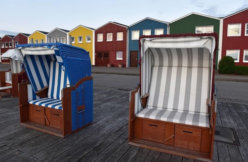 Beach chairs in front of the lobster shacks in Heligoland, Schleswig-Holstein, Germany, Europe