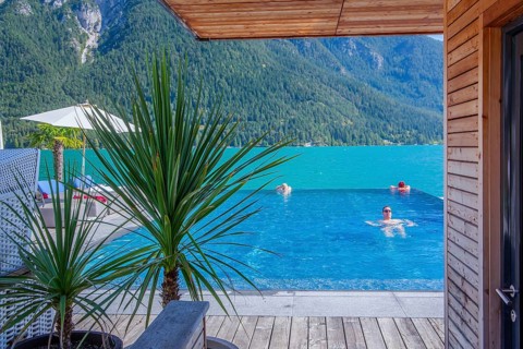 Infinity swimming pool on the lakeshore, Pertisau, Achensee, Tyrol, Austria, Europe