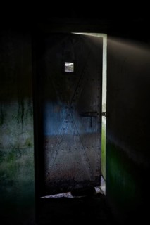 Bunker door from inside, Bunker Cheneux, dark, rays of light, 2nd World War, built 1933-1936,