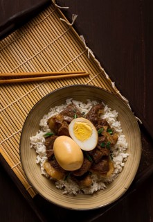 Stewed eggs, with pork belly, and rice, chinese food, homemade, selective focus, rustic, no people