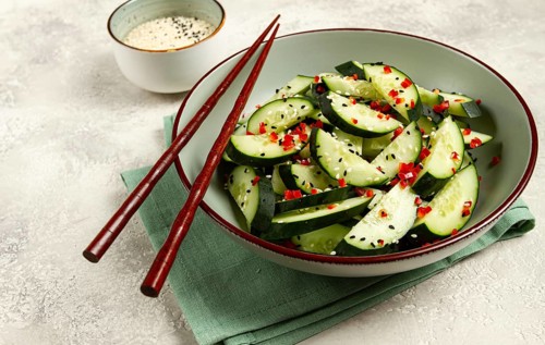 Chinese salad, cucumbers with chili pepper and sesame seeds, homemade, no people