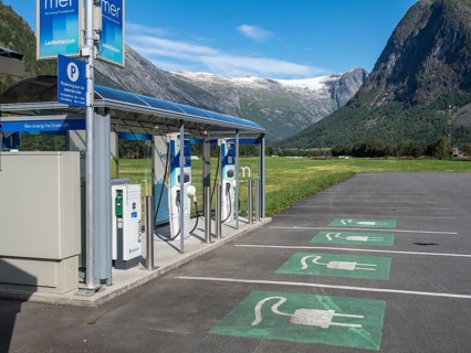 Charging station for electric cars in Fjaerland at the Sognefjord, mountains and glacier