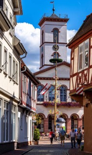 Half-timbered houses and the town hall tower in the old town centre, Seligenstadt, Hesse, Germany,