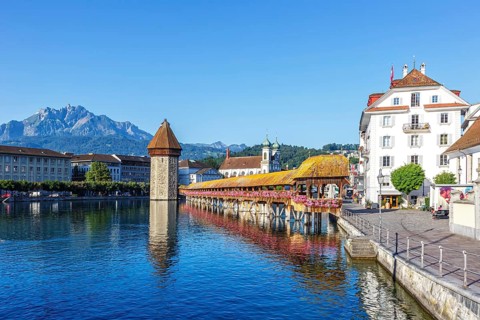 Lucerne city on the river Reuss with Chapel Bridge and Mount Pilatus in Lucerne, Switzerland,