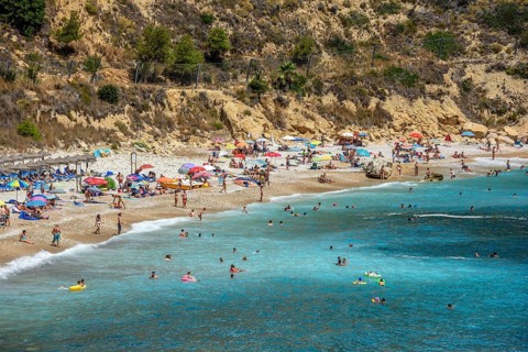 Bathers, Cala Moraig, beach Moraig near Benitachell, Costa Blanca, Spain, Europe