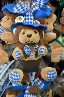 Teddy bear in traditional Bavarian dress on a stall, Oktoberfest, Munich, Upper Bavaria, Bavaria,