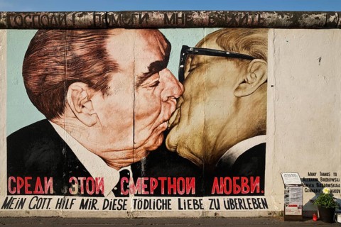 Brotherly Kiss, Brezhnev kisses Honecker, painting by Dmitri Vrubel on a remnant of the Berlin