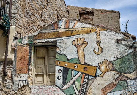 Political mural, work accident, artist Francesco del Casino, cubism, Orgòsolo, Province of Nuoro,