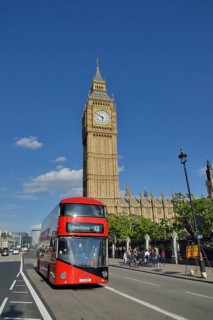 Red double-decker bus in front of the Big Ben, London, England, United Kingdom, Europe
