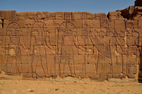 Relief of a procession with the deities Apedemak, Amun and Horus at the Lion Temple for the