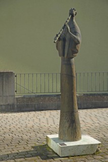 Sculpture Flute Player by Ernst Steinacker 2000, modern art, bronze, music, flute, district office,
