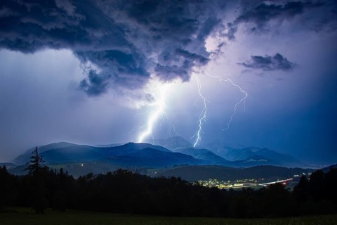 Lightning during a heavy thunderstorm over Siegsdorf and the Hochfelln, Chiemgau Alps, Bavaria,