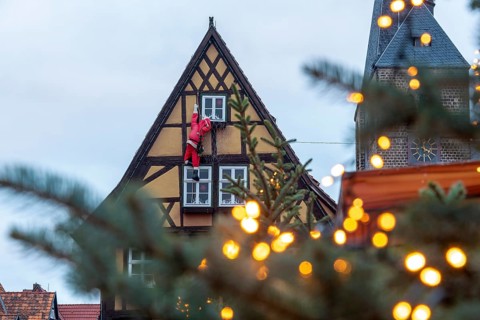 Historic half-timbered house with Father Christmas, Christmas lights, Quedlinburg, Saxony-Anhalt,