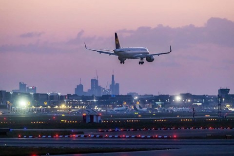 Aircraft of the airline Lufthansa approaching in the early morning, Frankfurt Airport, Fraport.