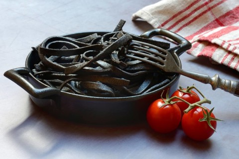 Black pasta coloured with squid ink in shell, Taglioni al Nero di Seppia, Italy, Europe
