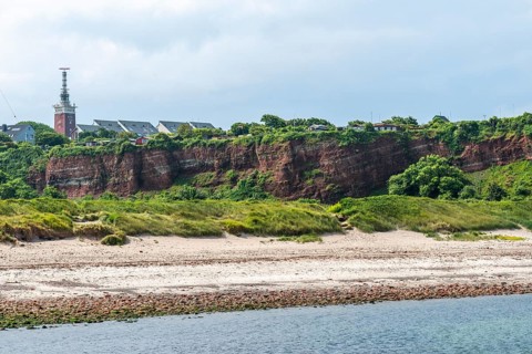 View over the northern beach, red sandstone cliff on the offshore island of Heligoland, allotment