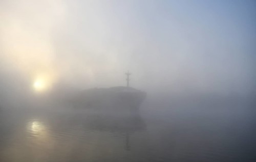 Cargo ship sailing in fog in the Kiel Canal, Kiel Canal, Schleswig-Holstein, Germany, Europe
