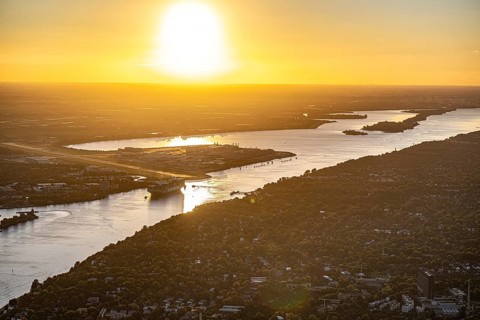 Aerial view of Hamburg harbour with Elbe, Airbus Airport Finkenwerder at sunset, Hamburg, Germany,