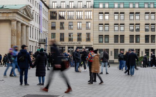 Motion blur, tourists and passers-by at Pariser Platz, Berlin, Germany, Europe