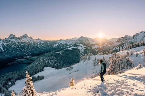 Hiking in the snow in the snow-covered winder landscape in the Alps at Neunerköpfle in the