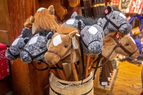 Steamboat Springs, Colorado, A barrel of children's hobby horses on sale at F.M. Light & Sons, a