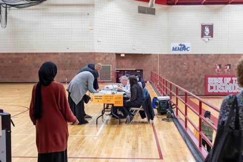 Hamtramck, Michigan USA, 27 February 2024, People check in to vote at Hamtramck High School in