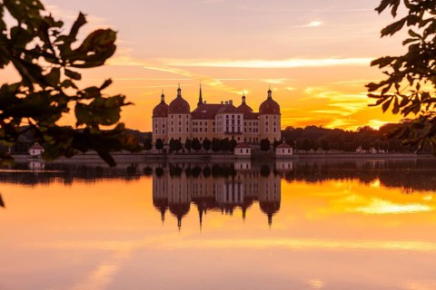 The moated castle, also known as a film set, lies in the middle of a lake and is a popular