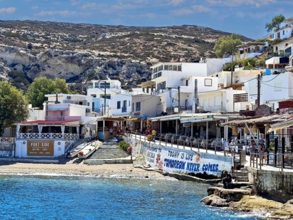 View of part of former fishing village Matala on south coast of Crete island in front of small
