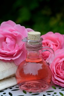 Rose blossom foam bath and rose blossoms, wellness