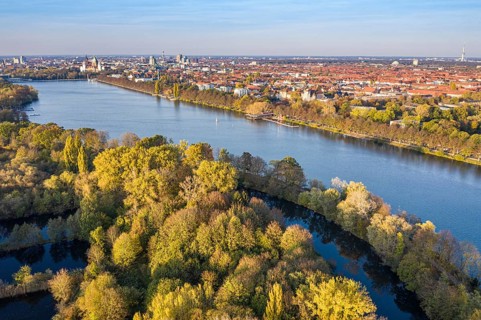 Drone shot of river Leine and lake Maschsee in autumn, Hannover city, Germany, Europe