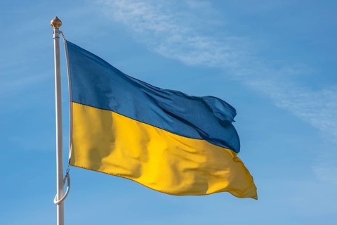 Ukrainian flag blowin in the wind at the harbor of Ystad, Scania, Sweden, Scandinavia, Europe