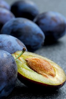 Plums (Prunus domestica) , plum, plum, plum, plum, halved