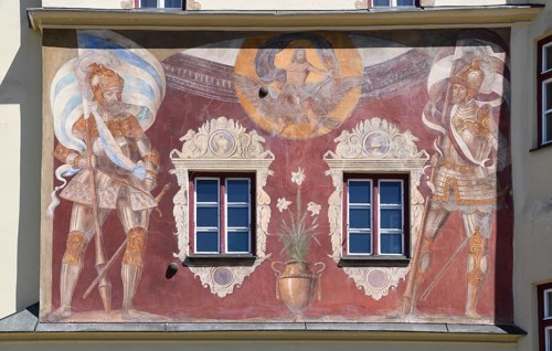 Medieval fresco of coulter guards with the Bavarian and moated castle banners and Jupiter on an