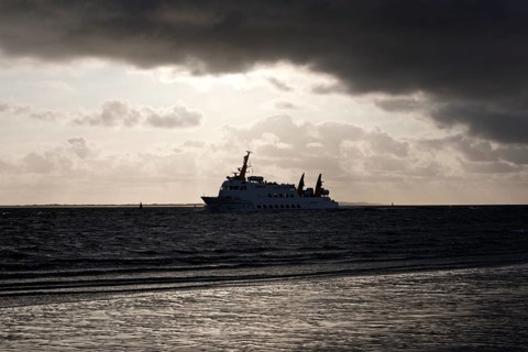 Seafaring vessel Frisia XI of the Norden-Frisia shipping company in bad weather off the East