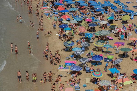 Tourists at the Playa Mal Pas, Benidorm, Province of Alicante, Costa Blanca, Spain, Europe