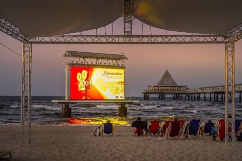 Summer cinema on the beach, screen, LED projection in the sea, Baltic Sea, Heringsdorf, Usedom,