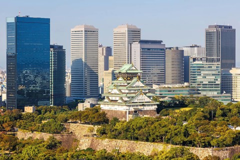 Osaka Castle from above with the skyline skyscrapers in Osaka, Japan, Asia
