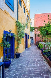 Scenic picturesque streets of Chania venetian town with coloful old houses. Chania greek village in