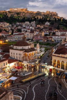 View over the old town of Athens, with Tzisdarakis Mosque and Acropolis, illuminated Monastiraki