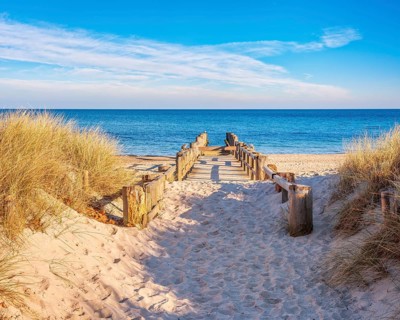 Beach access and old jetty on the beach of the Baltic Sea, Baltic resort Kühlungsborn,