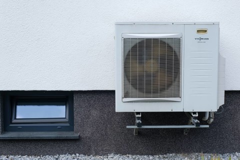 Heat pump on a house wall, North Rhine-Westphalia, Germany, Europe